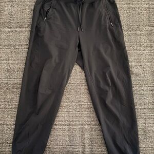 Lululemon Athletica Black Track Pants with Tapered Fit. Size 12